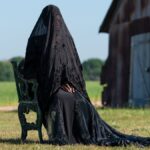 دانلود فیلم زنی در محوطه 2025